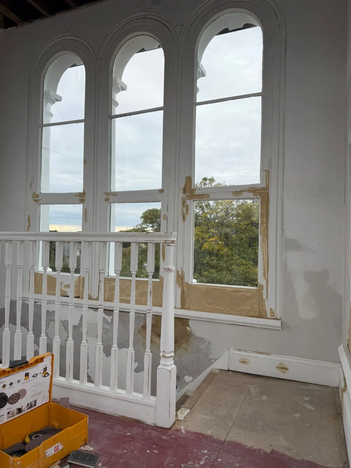 Before: arched window landing
